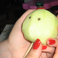 push eyes into apple